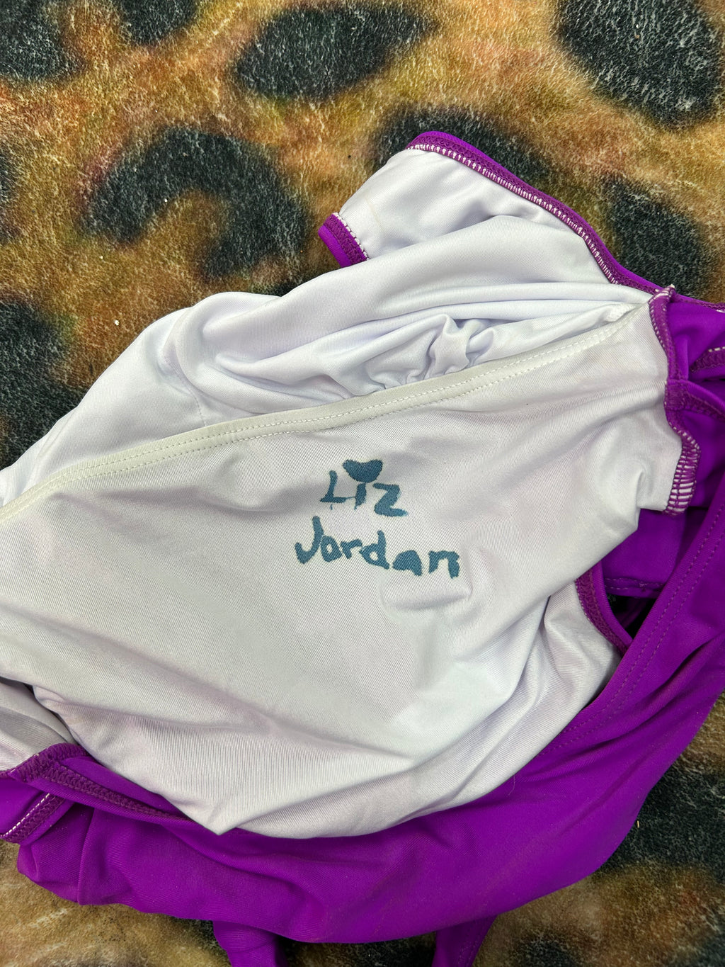 Autographed Purple Bodysuit